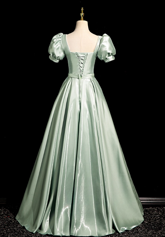 Robe de soirée glamour vert sauge, coupe trapèze, manches bouffantes et nœud, en satin DP7090