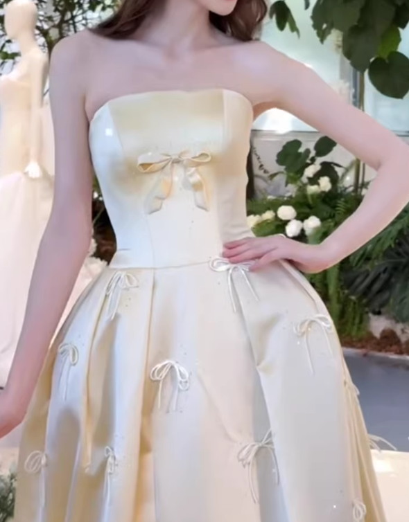 Robe de bal jaune bustier élégante ornée de nœuds pour Sweet 15 Quinceanera DP7935