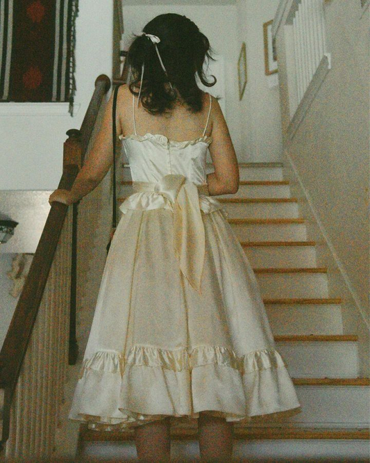 Robe de soirée mi-longue trapèze ivoire à bretelles spaghetti DP3830