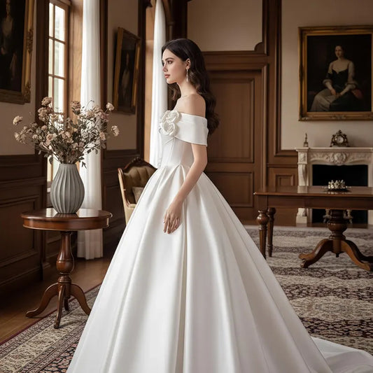 Elegant Ivory Off-the-Shoulder Satin 3D Floral A-Line Wedding Dress DP8594