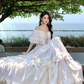 Vintage Elfenbein trägerloses Rüschensaum-Design Elegantes Strandurlaubs-Sommerkleid in A-Linie DP6264