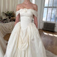 Romantisches elfenbeinfarbenes schulterfreies A-Linien-Brautkleid aus Taft DP8434