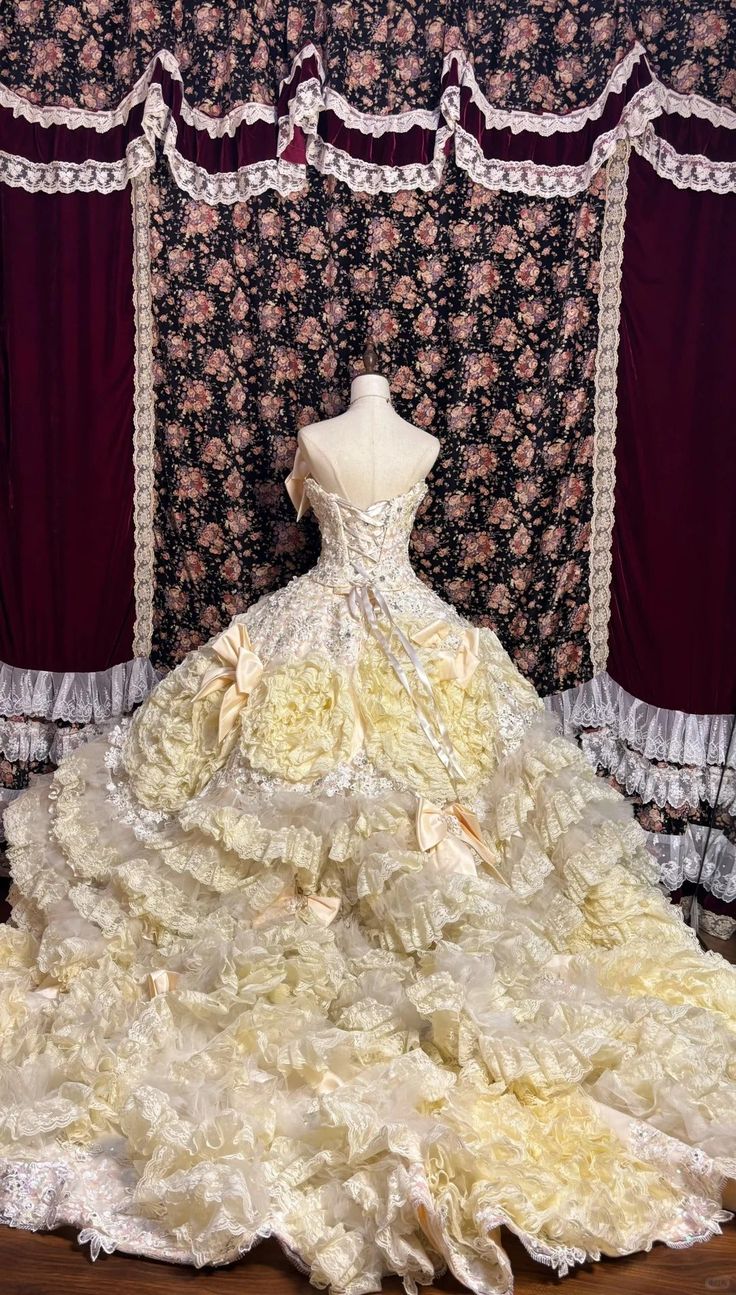 Vintage-Inspired Ivory Lace Ball Gown with Ruffled Details & Satin Bow Accents DP7008