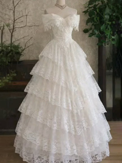 Romantic Ivory Off-the-Shoulder Tiered Lace A-Line Wedding Dress DP8616