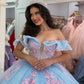 Glamorous Light Blue Cinderella-Inspired Pink Floral Applique Off-Shoulder Ruffled Quinceanera Sweet 15 Ball Gown DP7192