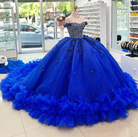 Robe de bal glamour bleu royal en tulle ornée de perles et d'appliqués, décolleté en cœur, idéale pour une quinceañera ou un Sweet 15 (DP7185)