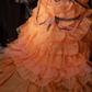 Glamorous Orange Off-the-Shoulder Beaded Ruffled Tulle Ball Gown DP8350