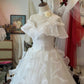 Romantic Off-the-Shoulder Ruffle Lace A-Line Wedding Dress DP8615