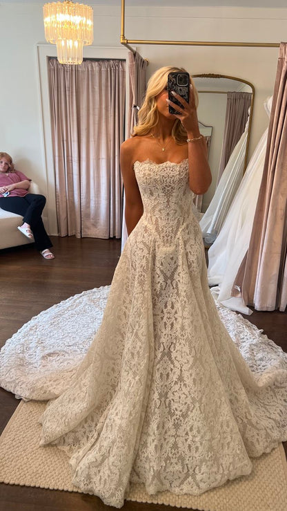 Robe de mariée bustier en dentelle coupe A ivoire romantique col cœur traîne chapelle DP8612