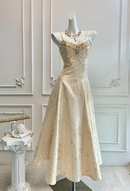 Vintage Champagne Gold Spaghetti Strap A-Line Beaded Evening Gown DP8402