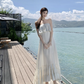Vintage Elfenbein trägerloses Rüschensaum-Design Elegantes Strandurlaub A-Linie Ärmelloses Sommerkleid DP6262