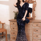 Robe de soirée sirène glamour bleu marine à sequins, col en V et manches bouffantes DP7476