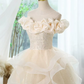 Elegant Champagne Off-the-Shoulder Satin Ruffle Beaded Bodice Glitter Tiered Tulle A-Line Homecoming Dress DP8739