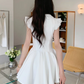 Cute White Collar Black Bow Short Sleeve Gold Button A-Line Homecoming Dress DP8760
