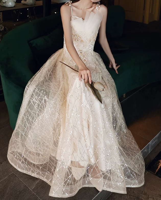 Elegant Champagne Spaghetti Straps Sequin Tulle A‑Line Evening Gown DP8824