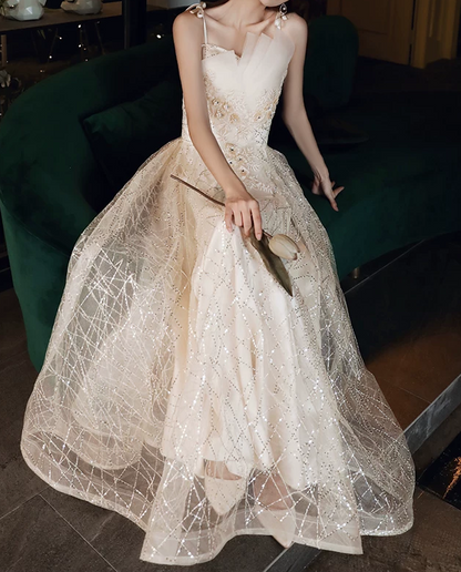 Elegant Champagne Spaghetti Straps Sequin Tulle A‑Line Evening Gown DP8824