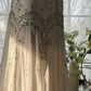 Elegantes Meerjungfrauen-Abendkleid DP8157 mit champagnerfarbenen Perlen und Spaghettiträgern