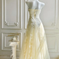 Vintage elfenbeinfarbenes, trägerloses A-Linien-Tüll-Ballkleid mit Perlen DP8404