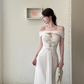 Wunderschönes elfenbeinfarbenes, schulterfreies, herzförmiges, perlenbesetztes Meerjungfrau-Abschlussballkleid mit Applikationen, langem Abendkleid DP6401