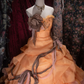 Glamorous Orange Off-the-Shoulder Beaded Ruffled Tulle Ball Gown DP8350