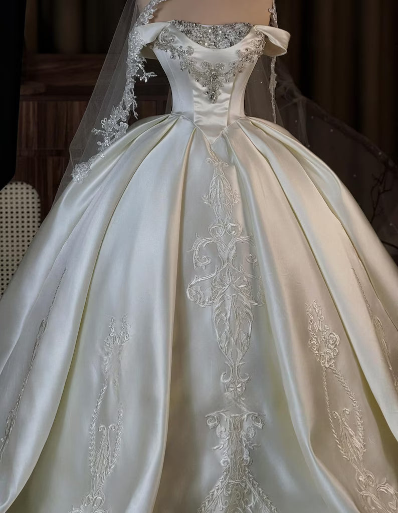 Elegant Ivory Off-the-Shoulder Satin Beaded Lace Embroidery A-Line Wedding Dress DP8592