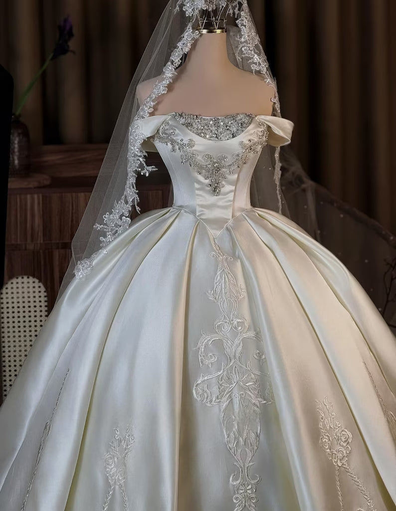 Elegant Ivory Off-the-Shoulder Satin Beaded Lace Embroidery A-Line Wedding Dress DP8592