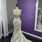 Robe de mariée sirène de luxe en satin ornée de perles avec décolleté illusion DP8426