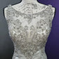 Robe de mariée sirène de luxe en satin ornée de perles avec décolleté illusion DP8426